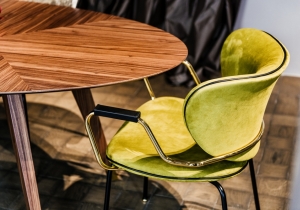 furniture: "CALIDA DINING" THE METAL BASE HAS A MATTE BLACK LACQUER, WHILE THE STEEL ARMRESTS HAVE A POLISHED GOLD FINISH MATCHING THE METAL FERRULES. THE LIME GREEN NUBUCK LEATHER UPHOLSTERY ADDS A ZESTY ACCENT TO THIS SOPHISTICATED AND MODERN PIECE. | ARCHONTIKIS - BLACKTIE
