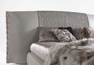 furniture: NILO THE IMPORTANT HEADBOARD IS THE DISTINCTIVE ELEMENT OF THE NEW NILO BED. THE REFINED EMBROIDERY ON THE CENTRAL PART CONTRASTS WITH THE SMOOTH SIDE BANDS, WHILE THE BINDING WITH METALLIC CHAIN LENDS A GLAM-CHIC CHARM | ARCHONTIKIS - ROBERTO CAVALLI